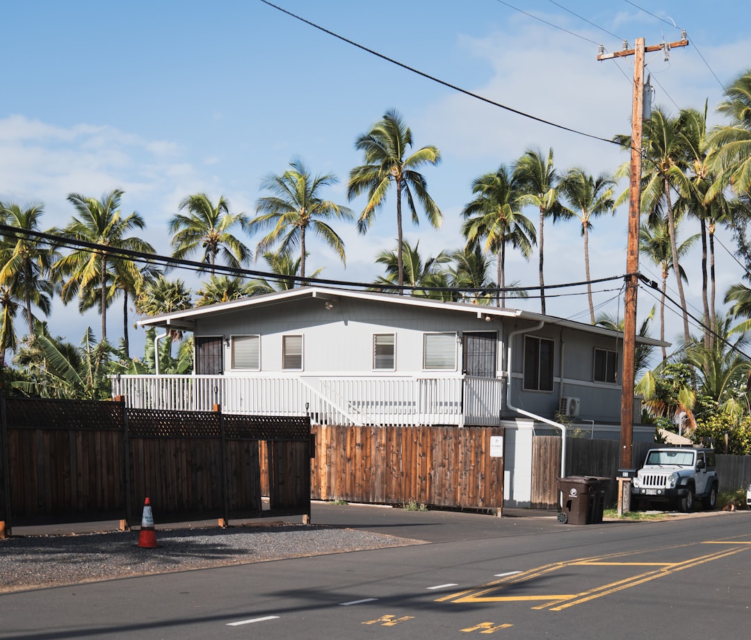 Framing contractor working at height on a Hawaii construction site without fall protection