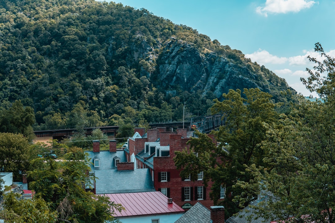 Roofing contractor working at height on a residential roof in Hurricane, West Virginia