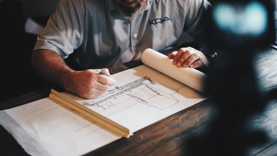 Construction supervisor reviewing paperwork on a job site