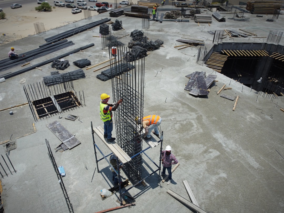 Roofing crew working on a residential construction site