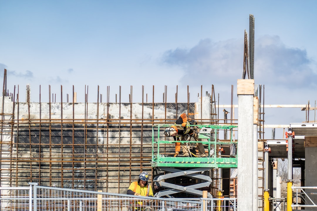 Framing contractor working at height without fall protection on a South Carolina construction site