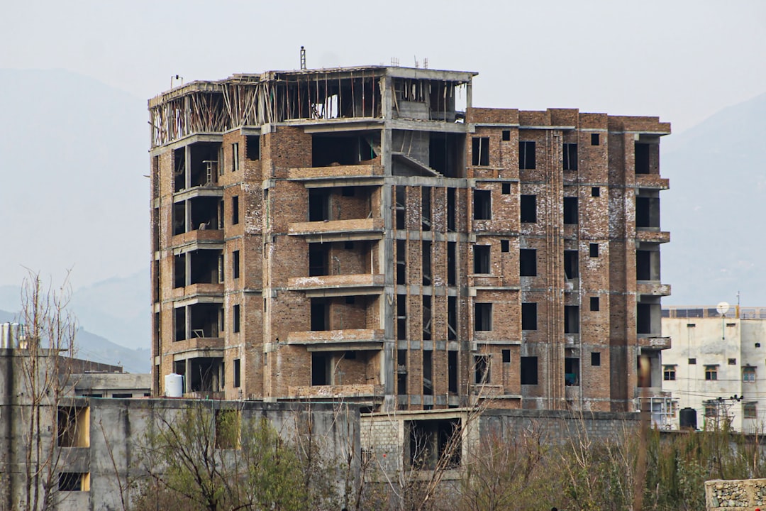 Framing contractor working at height on a residential roof deck in Louisiana without visible fall protection