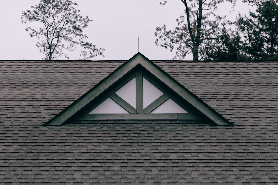 Roofing contractor working at height without fall protection in West Virginia, illustrating an OSHA 1926.501 violation
