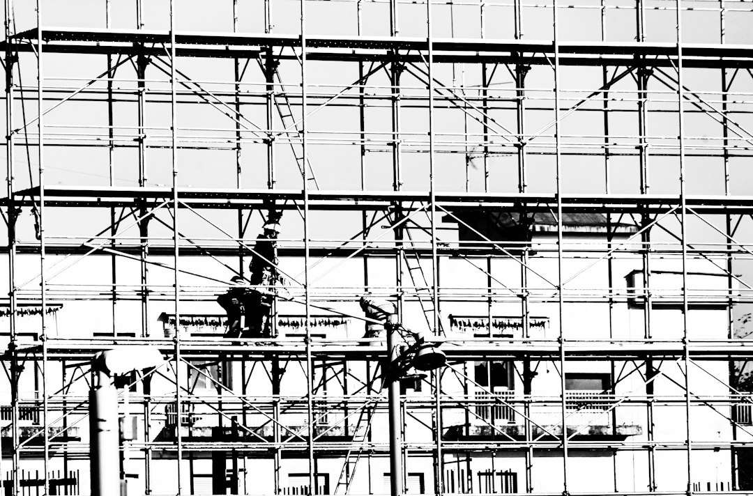 Siding contractor crew working on scaffolding at a construction site in Ohio